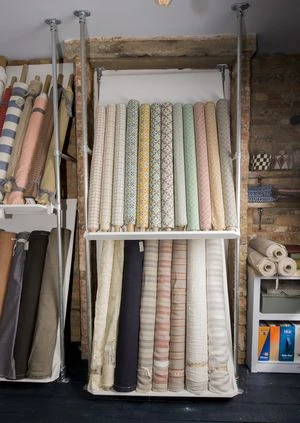 Fabric on a shelf made from tubes
